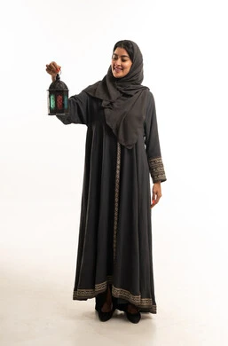 Saudi Woman in Black Abaya Holding Ramadan Lantern