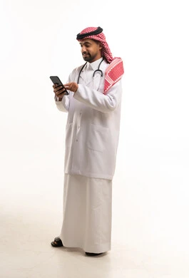 Saudi Male Doctor Using Smartphone in Lab Coat