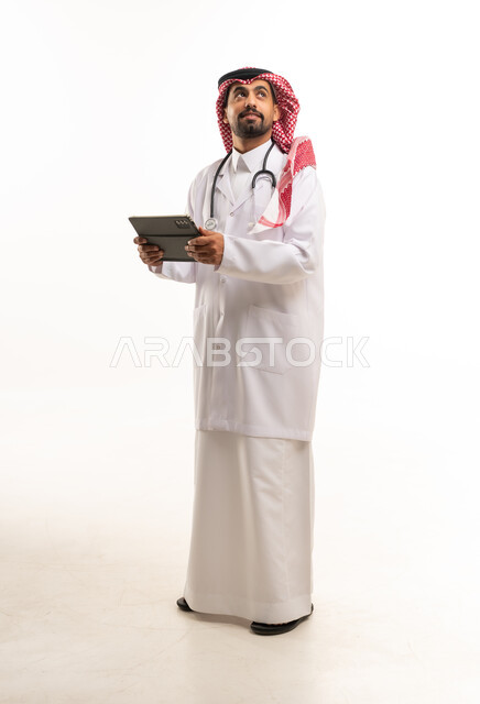 Saudi Male Doctor with Tablet in Studio