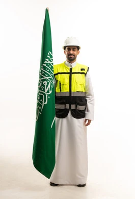 Saudi Engineer Wearing Safety Gear Holding National Flag