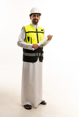 Saudi Engineer in Thobe and Safety Vest with Blueprint