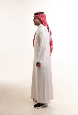Saudi Man in Traditional Thobe and Shemagh Profile