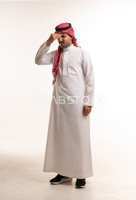 Saudi Man in Thobe with Headache on White Background