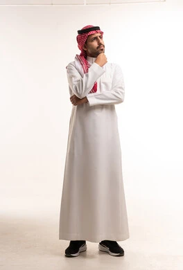Thinking Saudi Man in Traditional Thobe and Shemagh