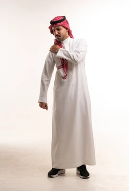 Saudi Man in Thobe with Shoulder Pain on White Background