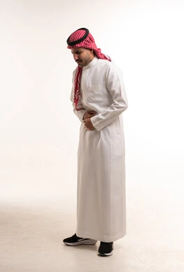 Saudi Man in Traditional Thobe with Stomach Pain Studio