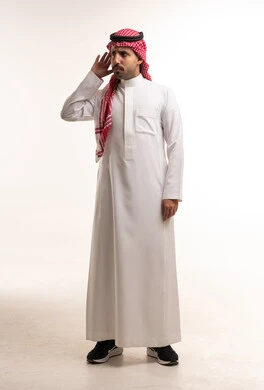 Saudi Man in Traditional Thobe Making Listening Gesture