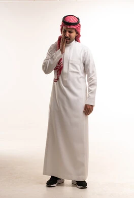 Saudi Man in Thobe Experiencing Toothache Pain