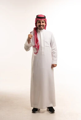 Smiling Saudi Man in Traditional Dress on White Background