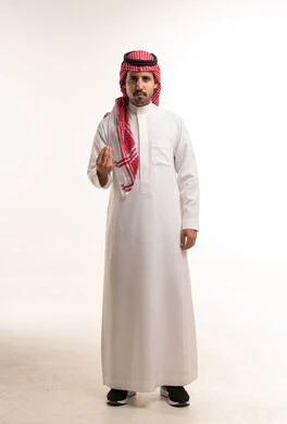 Saudi Arabian Man in Traditional Thobe Making Hand Gesture