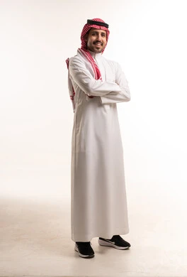 Smiling Saudi Man in Traditional Thobe on White Background