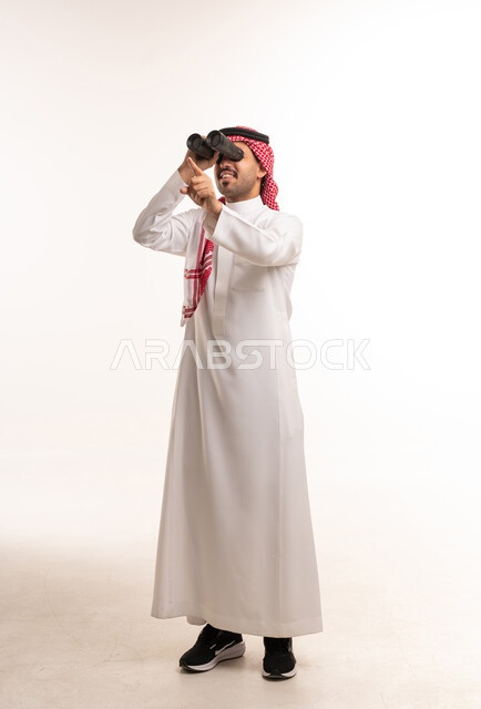 Saudi Man in Thobe Using Binoculars on White Background