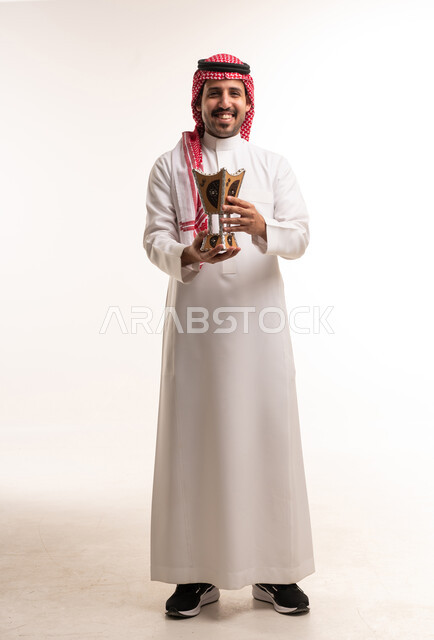 Saudi Man Holding Traditional Incense Burner on White Background