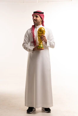 Saudi Man Holding Gold World Cup Trophy Studio Shot