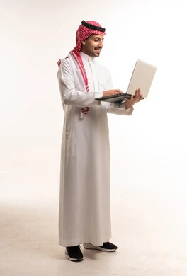 Saudi Man in Traditional Thobe Using Laptop on White Background