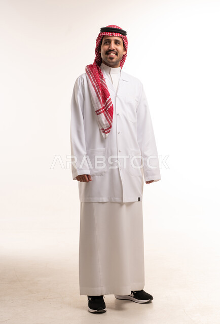Saudi Male Doctor in White Lab Coat and Thobe