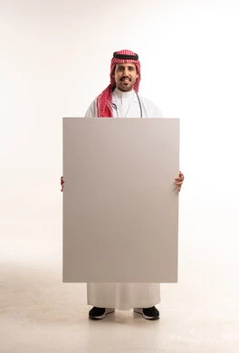 Saudi Male Doctor Holding Blank White Poster Board