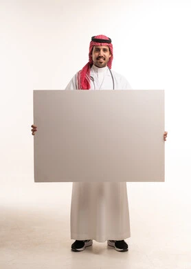 Saudi Male Doctor Holding Large Blank White Board