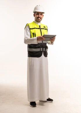 Saudi Engineer in Safety Gear with Tablet
