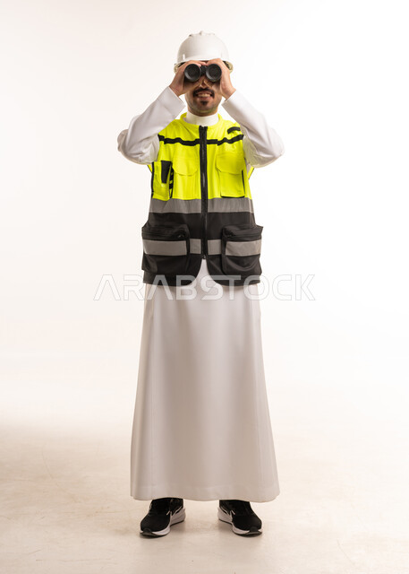 Saudi Engineer with Binoculars and Safety Gear