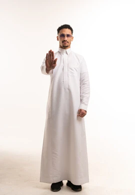 Saudi Man in White Thobe Making Stop Gesture