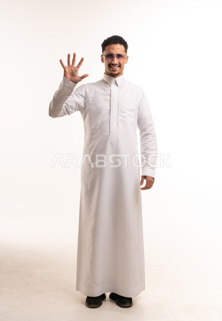 Saudi Man in White Thobe Showing Five Fingers