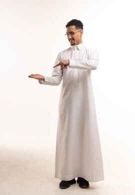 Saudi Man in Thobe Pointing to Hand on White Background