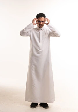 Stressed Saudi Man in Traditional Thobe Studio Shot