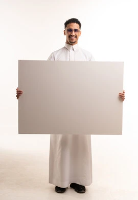 Saudi Man Holding Large Blank White Board in Studio