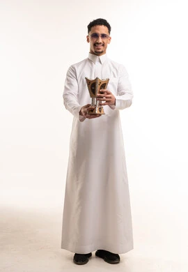 Saudi Man in White Thobe Holding Incense Burner