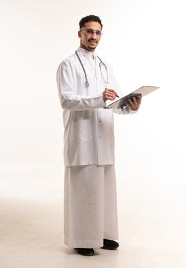 Saudi Male Doctor in Lab Coat Holding Clipboard
