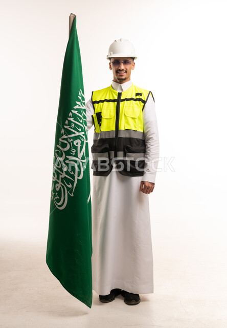 Saudi Engineer Holding National Flag and Safety Gear