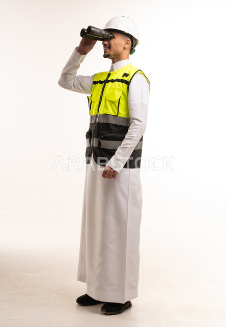Saudi Engineer with Binoculars in Traditional Thobe