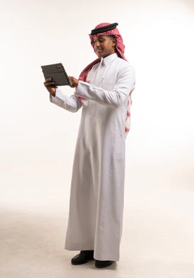 Saudi Man Using Digital Tablet on White Background
