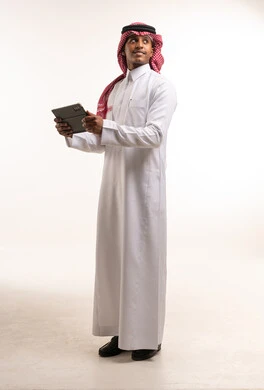 Saudi Man Holding Tablet on White Background