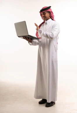 Saudi Man with Laptop on White Background Standing