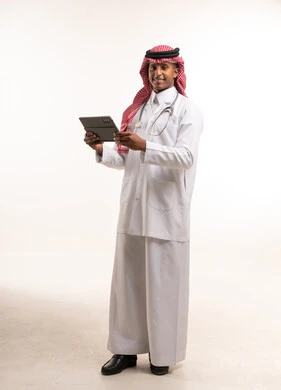 Saudi Male Doctor Holding Digital Tablet on White Background