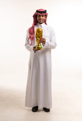 Saudi Man Holding Gold Football Trophy Studio Shot