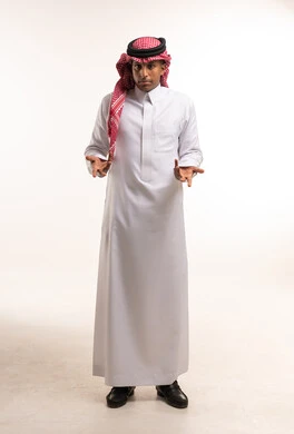 Saudi Man in Traditional Thobe Making Shrugging Gesture