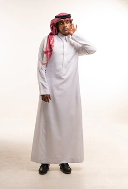 Saudi Man Wearing Thobe Listening Studio Shot