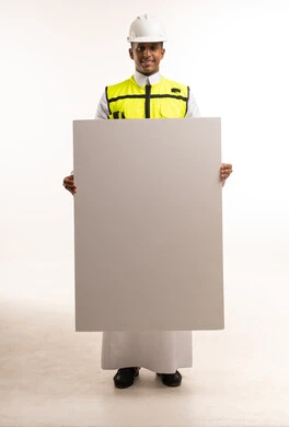 Saudi Engineer Wearing Safety Vest Holding Blank Board