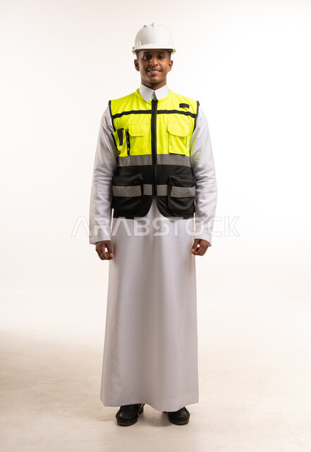 Saudi Engineer in Thobe and Safety Vest White Background