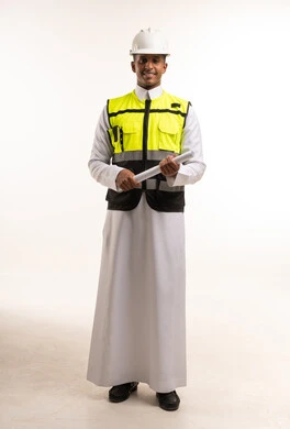 Saudi Engineer in Thobe and Safety Vest Holding Blueprint
