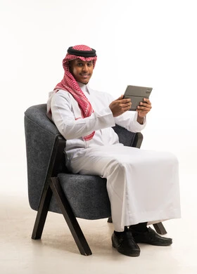 Saudi Man with Tablet on White Background