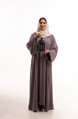 Saudi Woman in Abaya Holding Traditional Ramadan Lantern