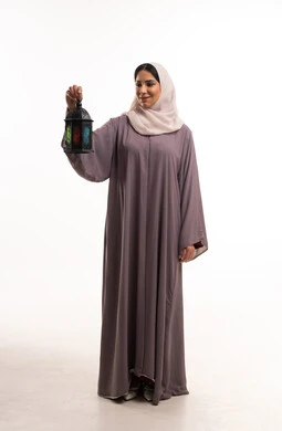 Saudi Woman in Abaya Holding Traditional Ramadan Lantern