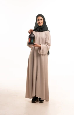 Saudi Woman with Ramadan Lantern in Traditional Abaya