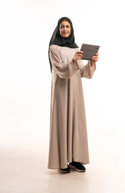 Arab Woman in Abaya Using Digital Tablet