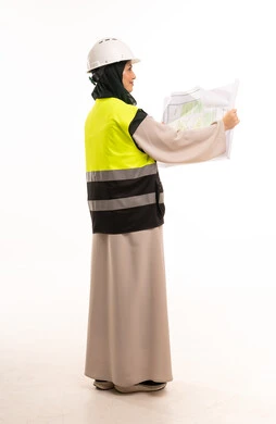 Saudi Female Engineer with Blueprint in Safety Vest