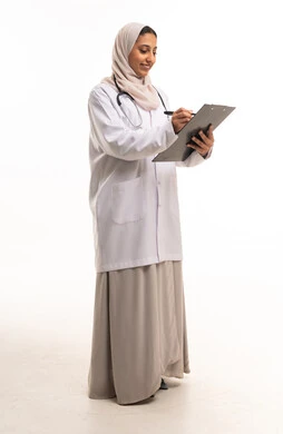 Saudi Female Doctor Writing on Clipboard in Studio